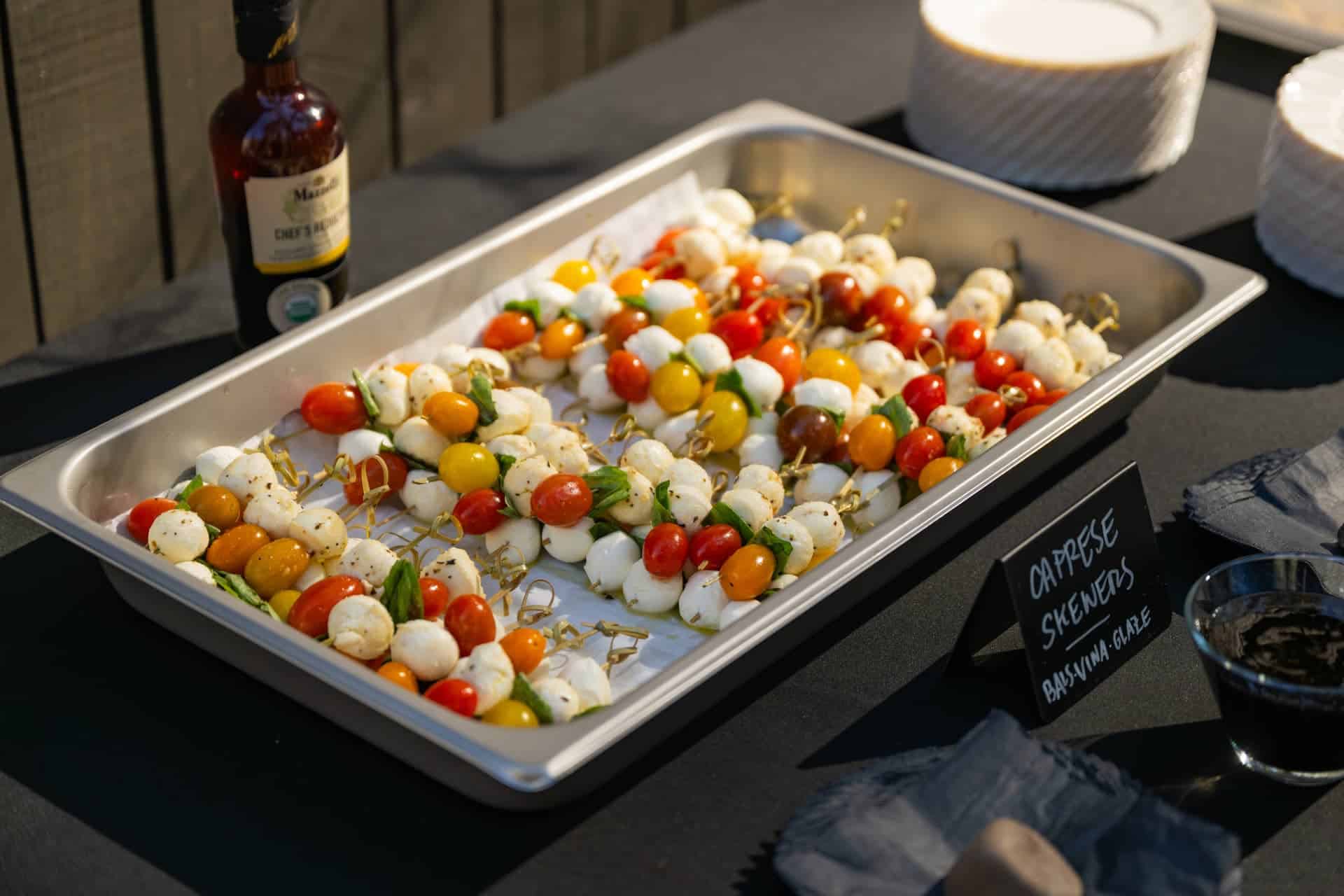 Caprese skewers with balsamic glaze on the buffet at a Sedona wedding catered by Vespa